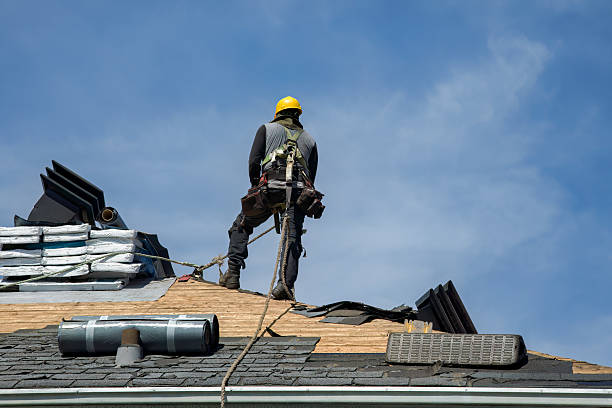 Professional Roofing technician working in Woolstock, IA